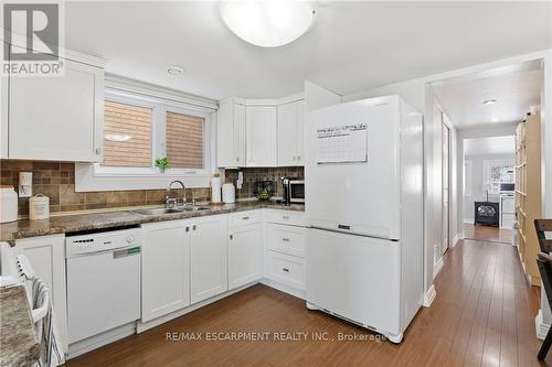 25 Delena Avenue N, Hamilton, ON - Indoor Photo Showing Kitchen With Double Sink