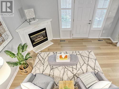 1214 Limberlost Road, London North (North I), ON - Indoor Photo Showing Living Room With Fireplace