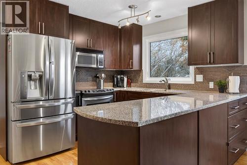 68 Bermondsey Rise Nw, Calgary, AB - Indoor Photo Showing Kitchen With Upgraded Kitchen