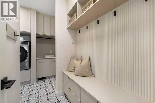 125 Discovery Place Sw, Calgary, AB - Indoor Photo Showing Laundry Room