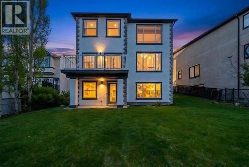 Virtually staged to show yard with greenery - 125 Discovery Place Sw, Calgary, AB - Outdoor