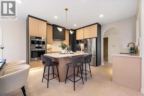 125 Discovery Place Sw, Calgary, AB - Indoor Photo Showing Kitchen With Stainless Steel Kitchen