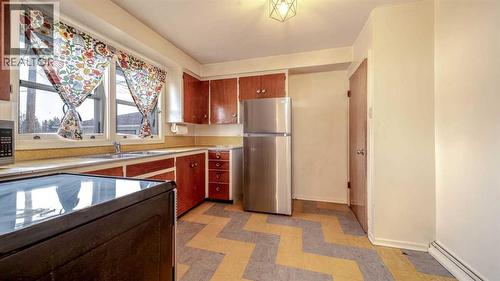 10 Marlowe Place Ne, Calgary, AB - Indoor Photo Showing Kitchen With Double Sink