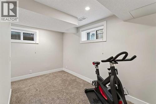 7 Westminster Place Sw, Calgary, AB - Indoor Photo Showing Gym Room