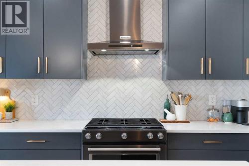 96 Emberside Glen, Cochrane, AB - Indoor Photo Showing Kitchen With Upgraded Kitchen