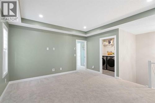 96 Emberside Glen, Cochrane, AB - Indoor Photo Showing Other Room