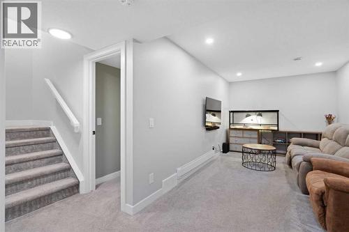 96 Emberside Glen, Cochrane, AB - Indoor Photo Showing Other Room