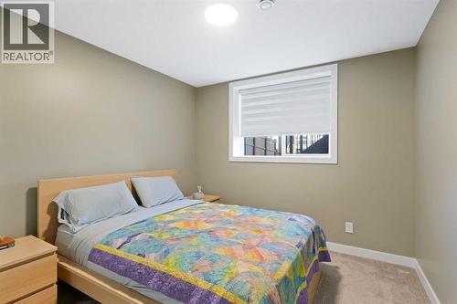 96 Emberside Glen, Cochrane, AB - Indoor Photo Showing Bedroom