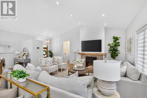 15 Pinecone Avenue, Tiny, ON - Indoor Photo Showing Living Room With Fireplace