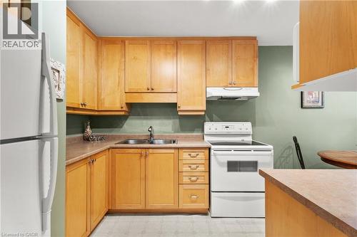 444 Stone Church Road W Unit# N1, Hamilton, ON - Indoor Photo Showing Kitchen With Double Sink