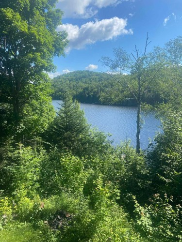 Vue sur l'eau - 851 Rue Des Tourterelles, Entrelacs, QC - Outdoor With Body Of Water