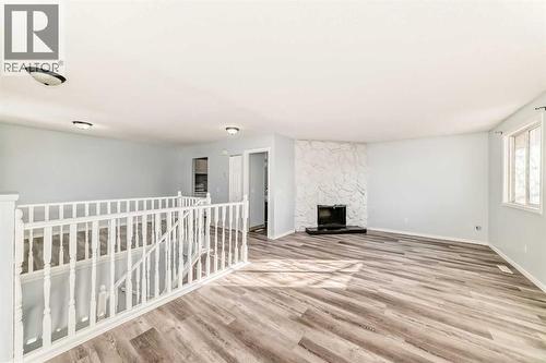 151F Pinehill Road Ne, Calgary, AB - Indoor Photo Showing Other Room With Fireplace