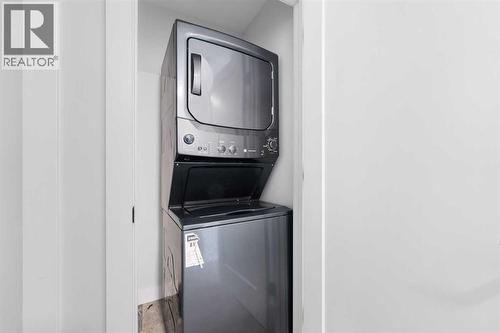 62 Walden Lane Se, Calgary, AB - Indoor Photo Showing Laundry Room