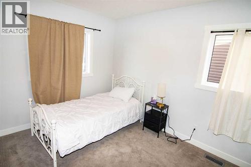 62 Walden Lane Se, Calgary, AB - Indoor Photo Showing Bedroom