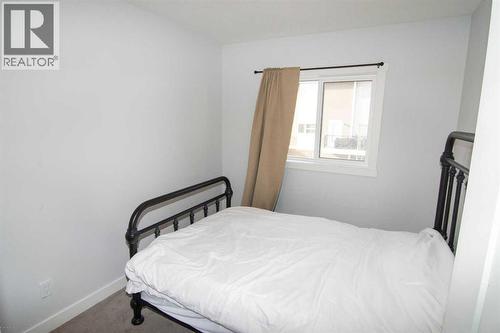 62 Walden Lane Se, Calgary, AB - Indoor Photo Showing Bedroom