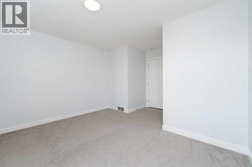 62 Walden Lane Se, Calgary, AB - Indoor Photo Showing Other Room