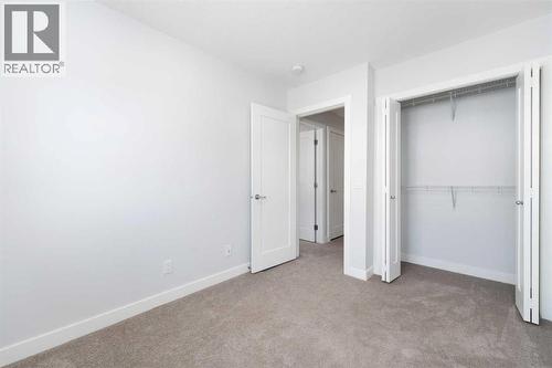 62 Walden Lane Se, Calgary, AB - Indoor Photo Showing Other Room