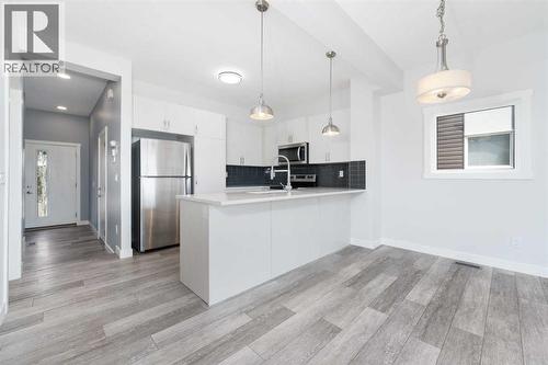 62 Walden Lane Se, Calgary, AB - Indoor Photo Showing Kitchen