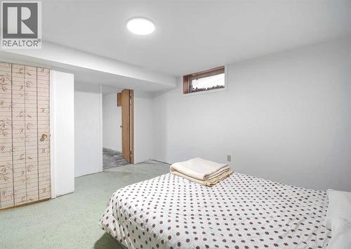 Lower level - 487 Arlington Drive Se, Calgary, AB - Indoor Photo Showing Bedroom