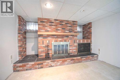 487 Arlington Drive Se, Calgary, AB - Indoor With Fireplace