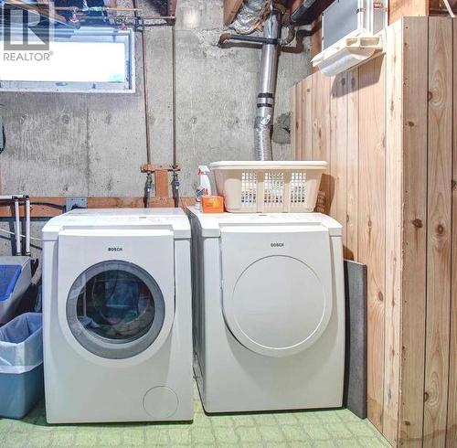 487 Arlington Drive Se, Calgary, AB - Indoor Photo Showing Laundry Room