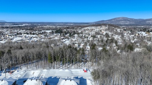 À construire - 101-141 Rue Du Cercle-Des-Cantons, Bromont, QC - Outdoor With View