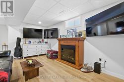 Bright basement with pot lights - 