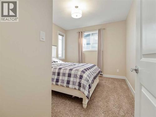 18 Northlander Road W, Lethbridge, AB - Indoor Photo Showing Bedroom