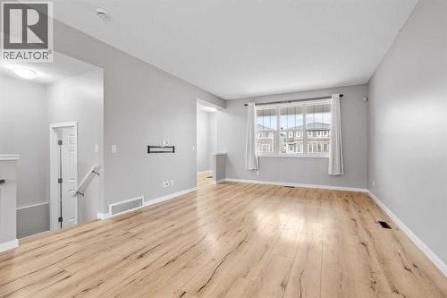 368 Redstone Drive Ne, Calgary, AB - Indoor Photo Showing Other Room With Fireplace