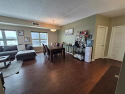 Dining area with 9 ft ceilings, laminate floors - 