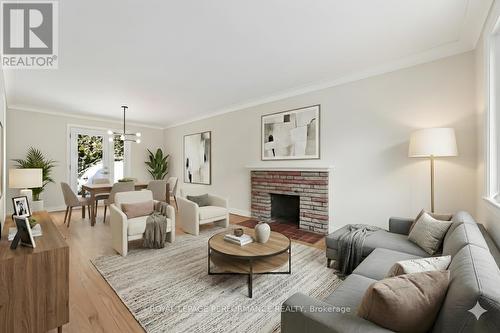 Virtually staged photo. - 274 Compton Avenue, Ottawa, ON - Indoor Photo Showing Living Room With Fireplace