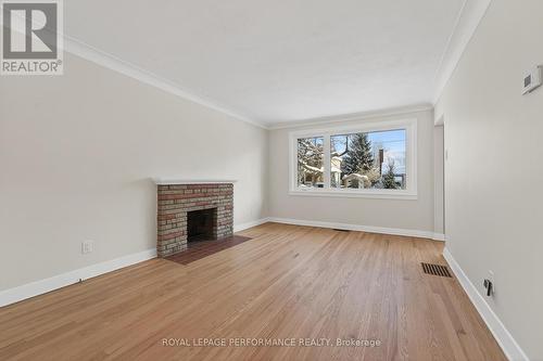 274 Compton Avenue, Ottawa, ON - Indoor Photo Showing Living Room With Fireplace