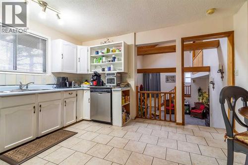 253 51 Avenue E, Claresholm, AB - Indoor Photo Showing Kitchen With Double Sink