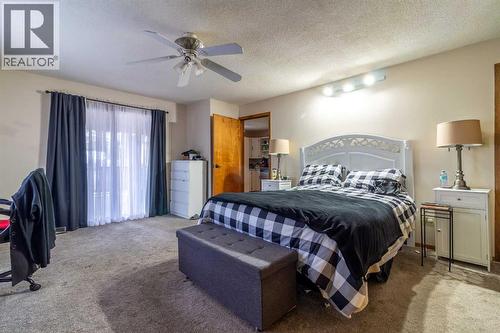 253 51 Avenue E, Claresholm, AB - Indoor Photo Showing Bedroom