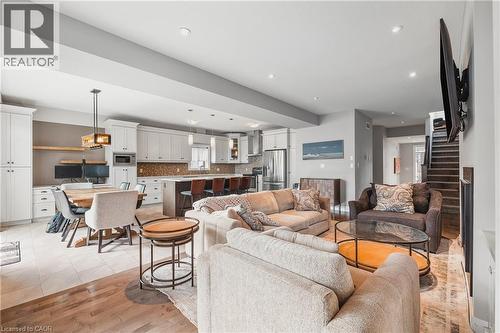 Living room featuring stairway, recessed lighting, and light wood-style floors - 346 Moorlands Crescent, Kitchener, ON - Indoor Photo Showing Living Room