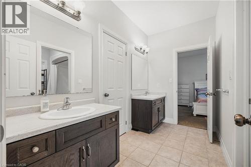 Ensuite bathroom with two vanities and light tile patterned flooring - 346 Moorlands Crescent, Kitchener, ON - Indoor Photo Showing Bathroom