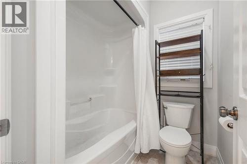 Bathroom with shower / tub combo and tile patterned flooring - 346 Moorlands Crescent, Kitchener, ON - Indoor Photo Showing Bathroom