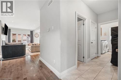 Corridor featuring washer and clothes dryer, recessed lighting, and light wood-style flooring - 346 Moorlands Crescent, Kitchener, ON - Indoor Photo Showing Other Room