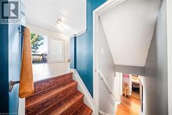 Staircase with wood finished floors - 