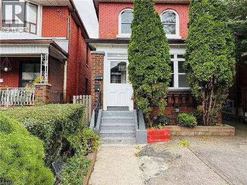 Property entrance featuring brick siding - 24 Somerset Avenue, Hamilton, ON - Outdoor With Facade