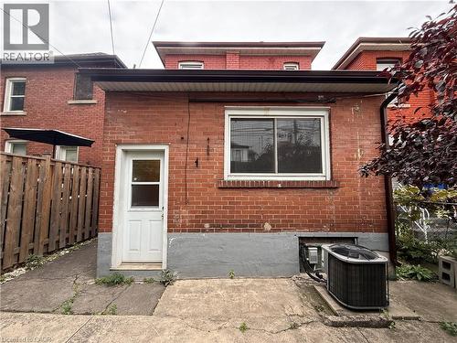 Rear view of property featuring brick siding - 24 Somerset Avenue, Hamilton, ON - Outdoor With Exterior