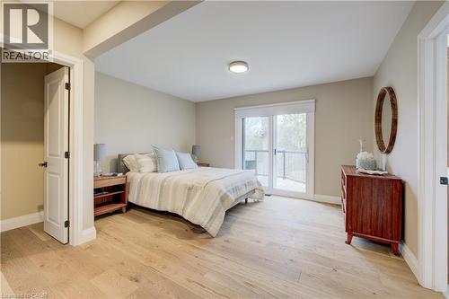 Bedroom featuring access to outside and light wood finished floors - 279 Ferndale Place, Waterloo, ON - Indoor Photo Showing Bedroom