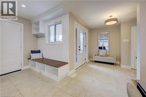 Mudroom with plenty of natural light and light tile patterned floors - 279 Ferndale Place, Waterloo, ON - Indoor Photo Showing Other Room