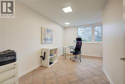Office featuring light tile patterned flooring - 
