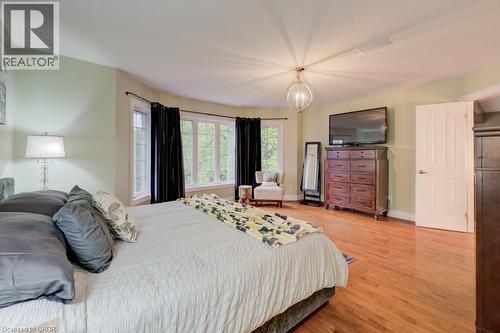 Bedroom featuring light wood finished floors and baseboards - 1525 Dickie Settlement Road, Cambridge, ON - Indoor Photo Showing Bedroom