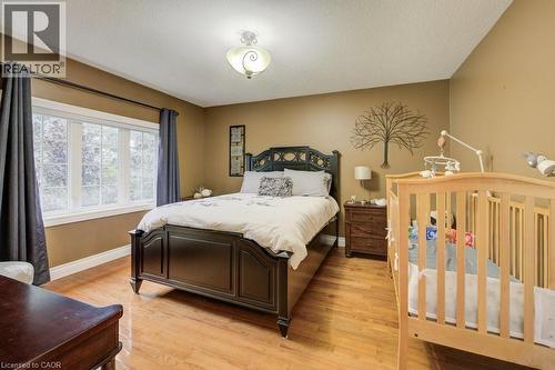 Bedroom featuring light wood-style floors and baseboards - 1525 Dickie Settlement Road, Cambridge, ON - Indoor Photo Showing Bedroom