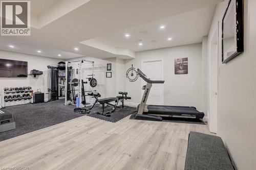 Exercise area featuring wood finished floors and recessed lighting - 1525 Dickie Settlement Road, Cambridge, ON - Indoor Photo Showing Gym Room