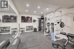Gym featuring recessed lighting - 