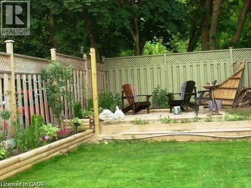 View of fenced backyard - 134 Courtland Avenue E, Kitchener, ON 