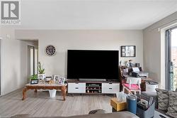 Living room with wood finished floors - 